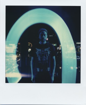 Man Standing Behind Light