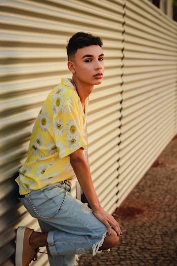 Man Standing Beside Wall