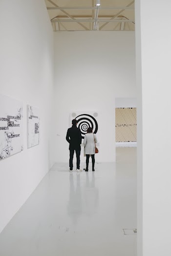 Man Standing Beside Woman