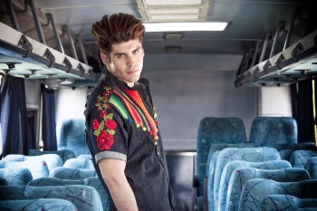 Man Standing Between Passenger Seats