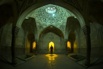 Man Standing  Inside a Building