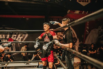 Man Standing Inside Boxing Ring