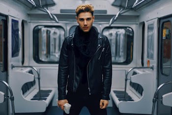 Man Standing Inside Train
