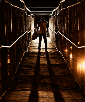 Man Standing Inside Tunne