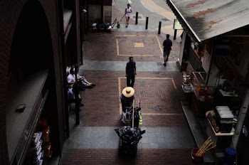 man standing near building