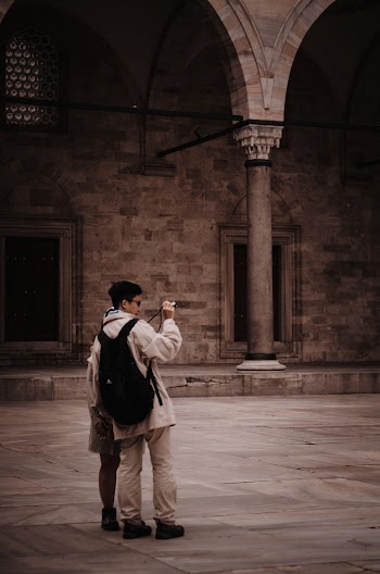 Man Standing Near Building