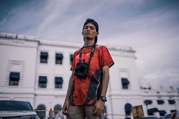 Man Standing Near Building