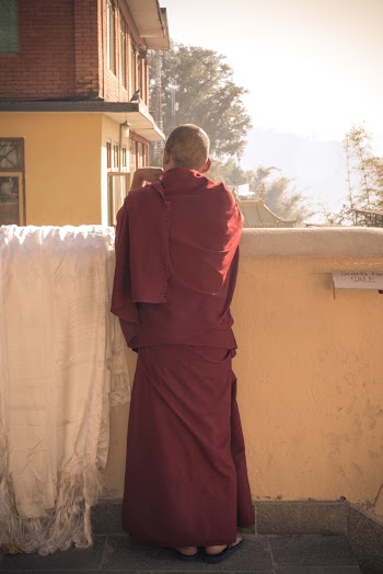 Man Standing  Near Comcrete Wall