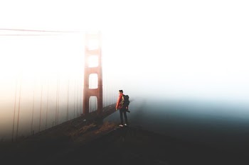 man standing near Golden Gate bridghe