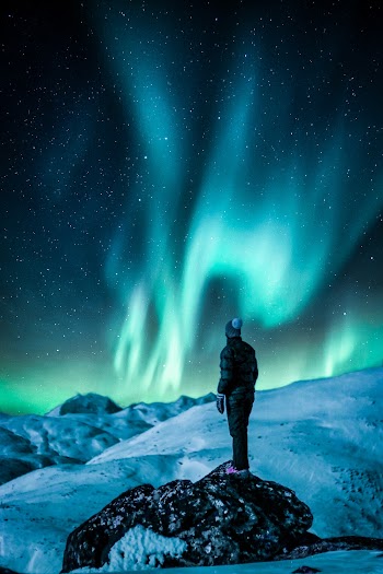 Man Standing Near Snow Field