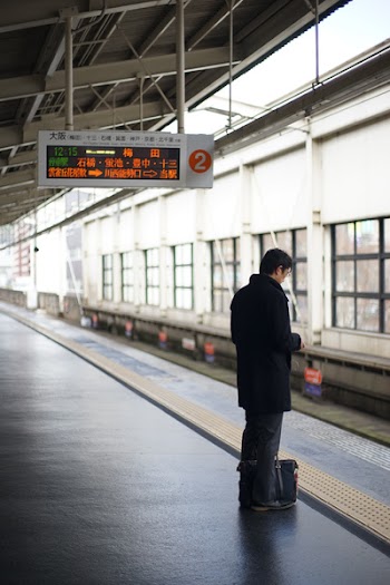 Man Standing Near Subway Station