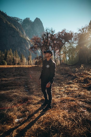 Man Standing Near Tree