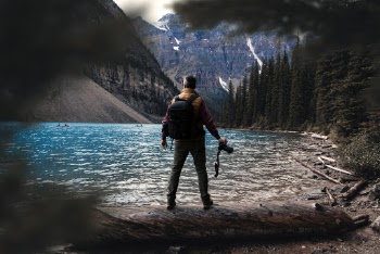 Man Standing Near Water