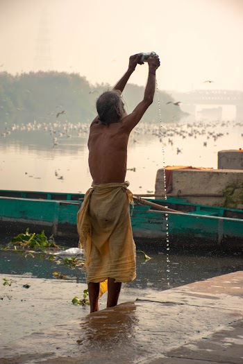 Man Standing on a Body of Water