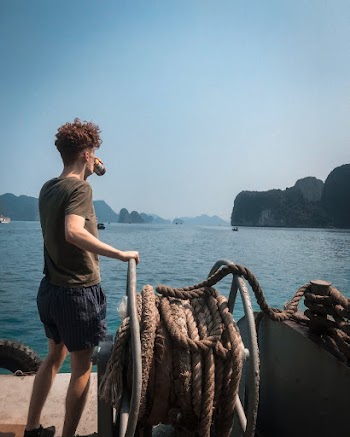 Man Standing On A Deck