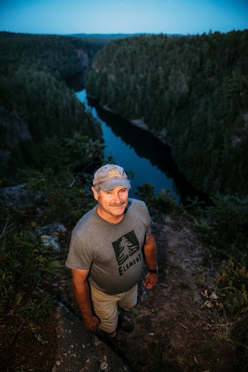 Man Standing On A Rock