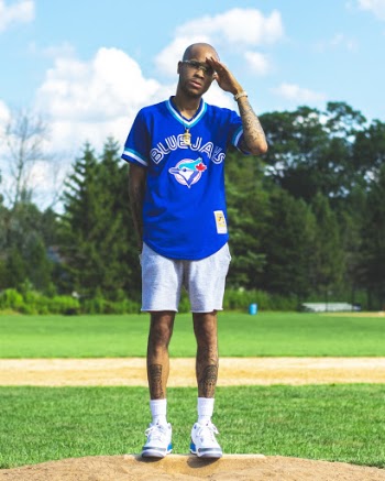 Man Standing on Baseball Mound