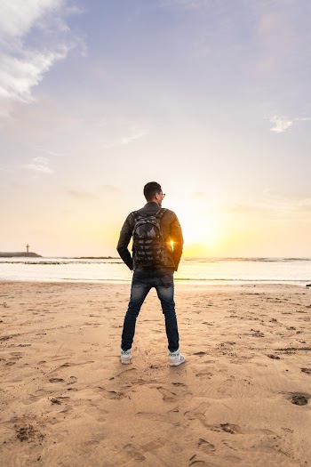 Man Standing on Beach