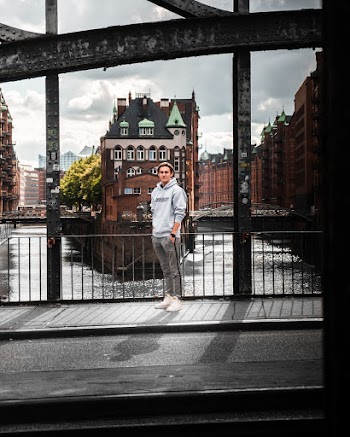 Man Standing On Bridge
