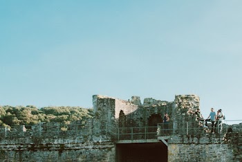 Man Standing on Building Deck