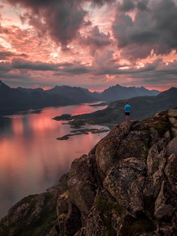 Man Standing on Cliff