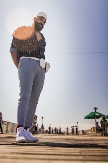 Man Standing on Concrete Ground