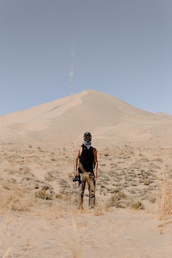 Man Standing on Desert