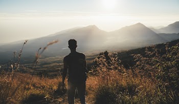 Man Standing on Field