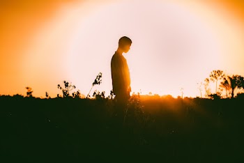Man Standing On Field