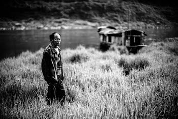 Man Standing on Grass Field