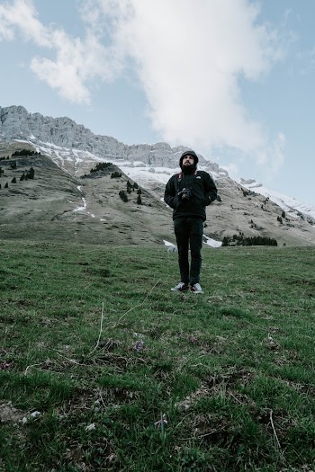 Man Standing on Grasses