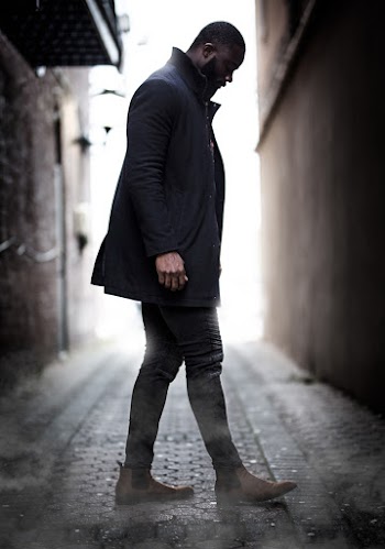 Man Standing on Gray Pathway