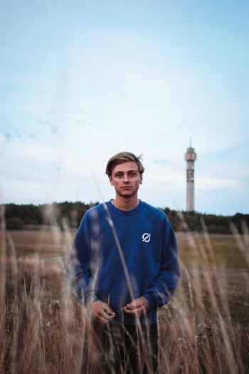man standing on hill outdoor