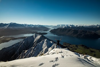 Man Standing On Mountain 
