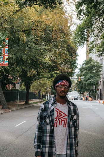 Man Standing on Road