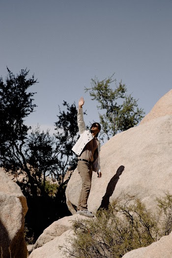 Man Standing on Rock