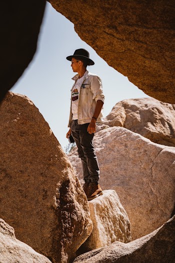 Man Standing on Rock