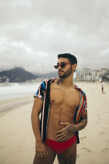 Man Standing on Seashore