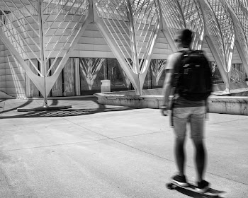 man standing on skateboard