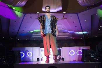 Man Standing on Stage