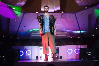 Man Standing on Stage