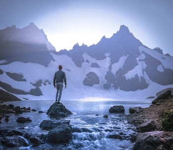Man Standing On Stone