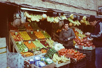 Man Standing on Store