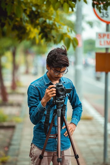 Man Standing on Streets