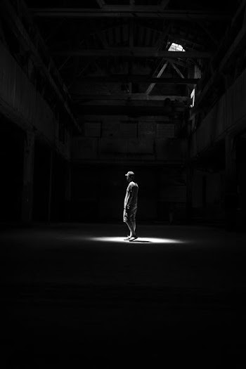 man standing on the light