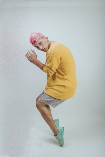 Man Standing on Tiptoes
