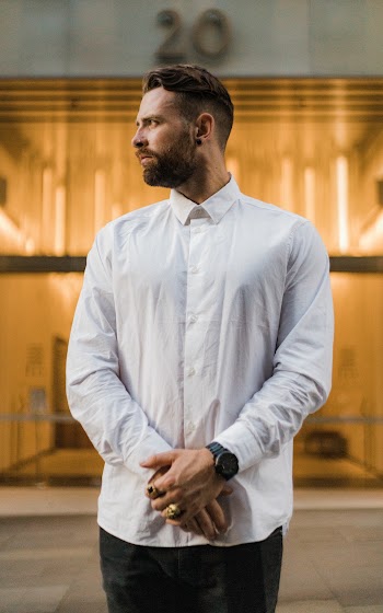 Man Standing Outside Building