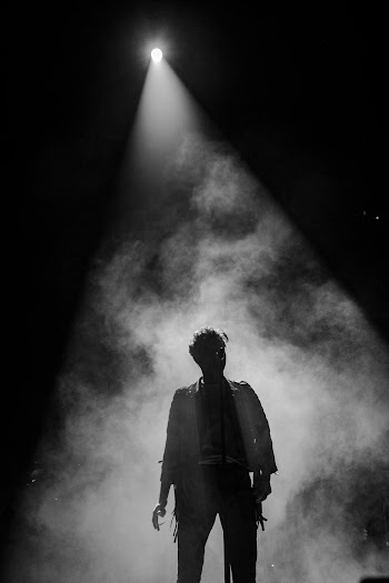Man Standing Surrounded With Smoke
