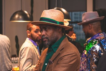 Man Standing Wearing Brown Hat