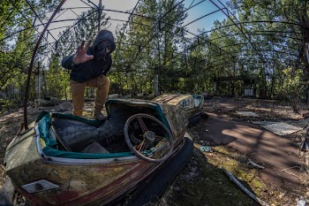 Man Standing Wearing Gas Mask